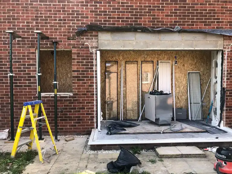 Back wall of the house propped ready for the steels