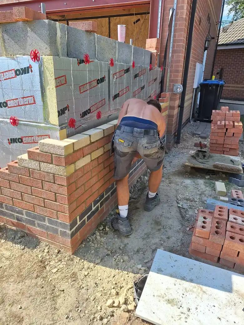 Blockwork and insulation going up