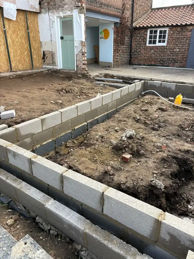 Blockwork rising from the footings