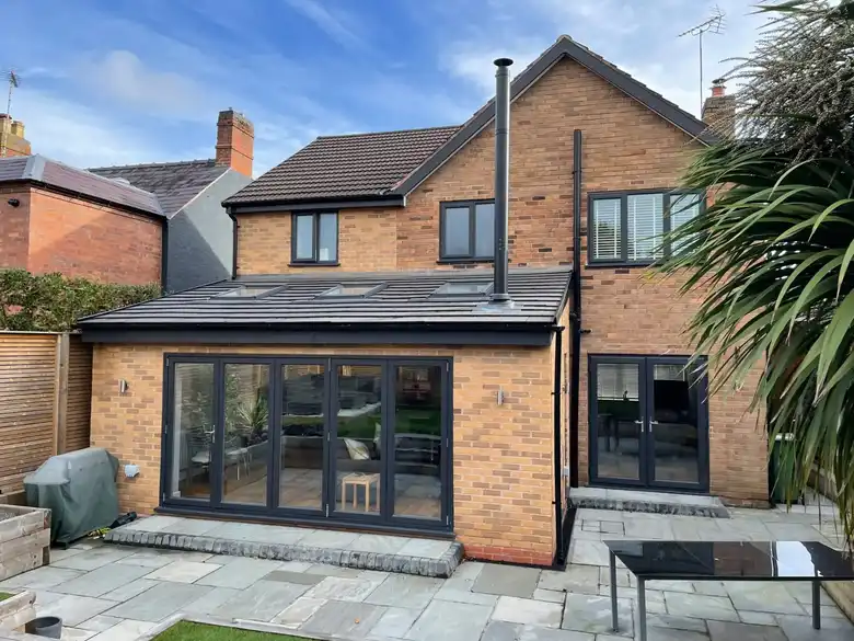 Brick single storey rear extension with bifold doors