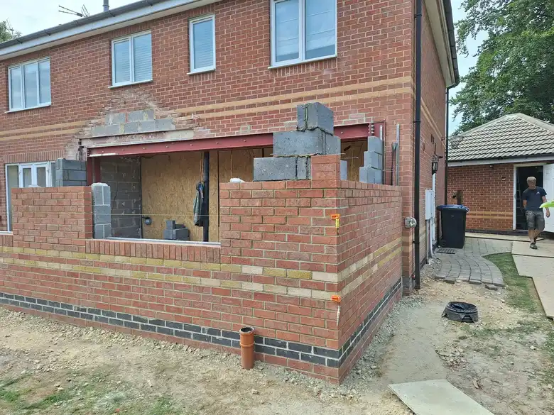 Brickwork rising at the rear