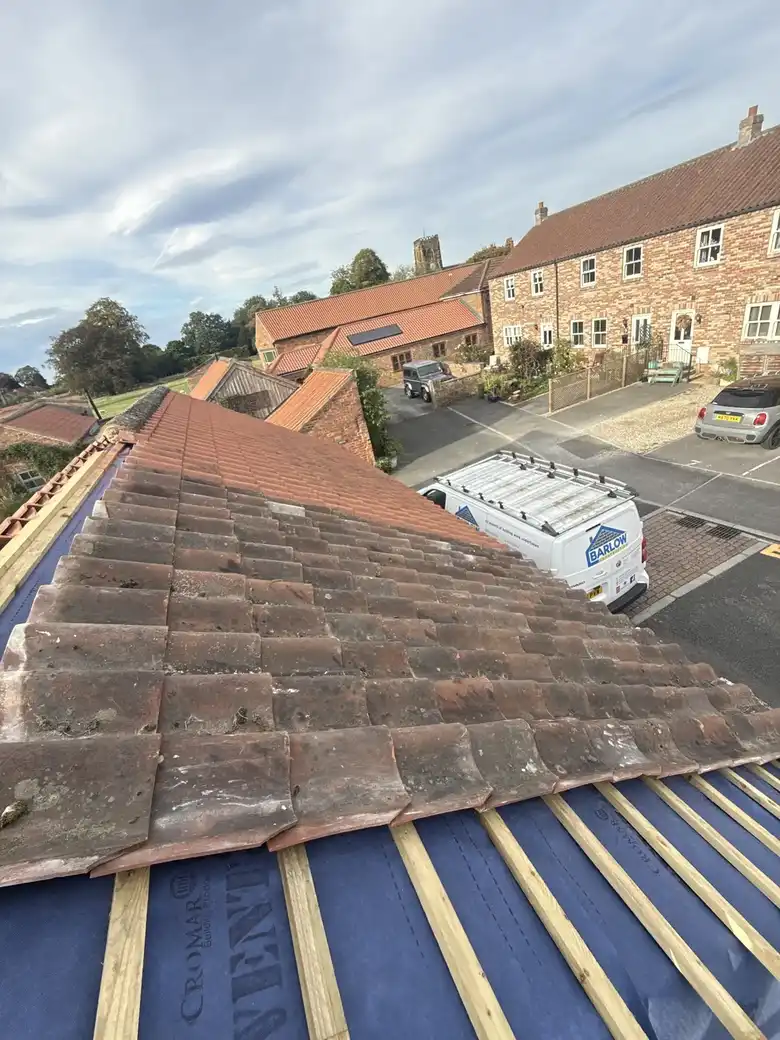 Clay pantiles going on