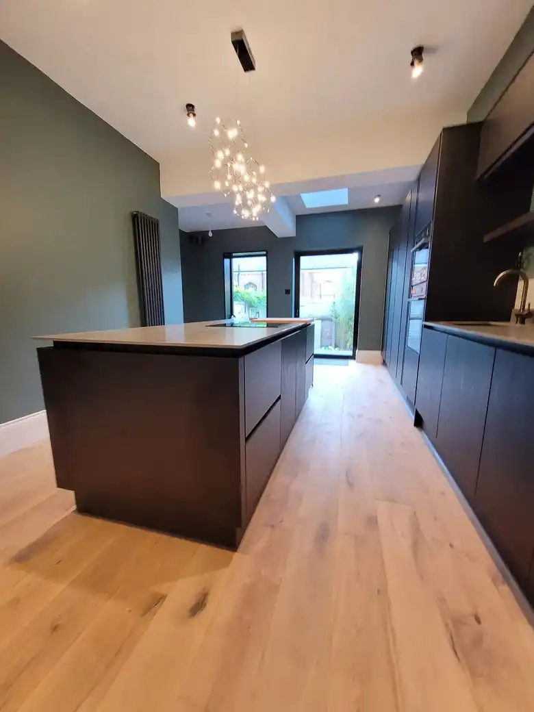 Dark kitchen with oak floor