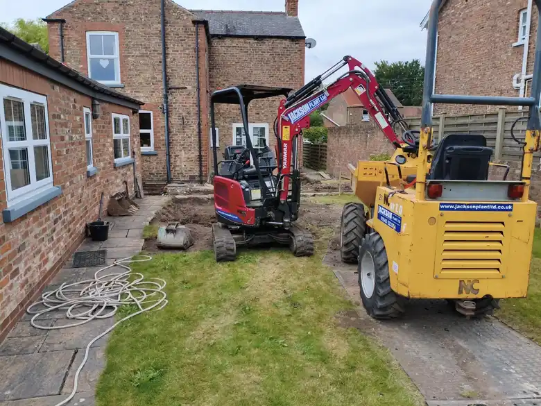 Diggers in the back garden ready to start