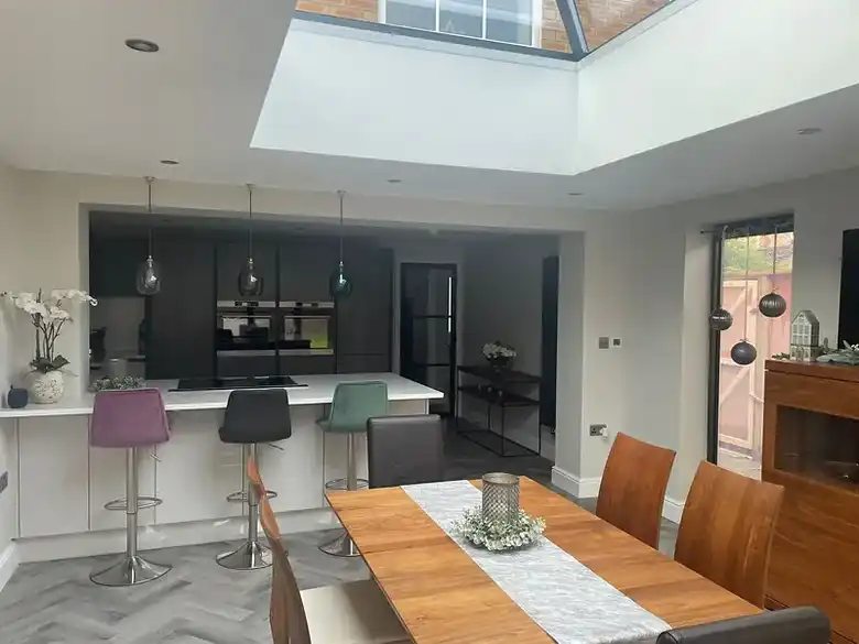 Dining area under a roof lantern