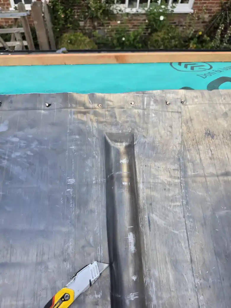EPDM flat roof being laid
