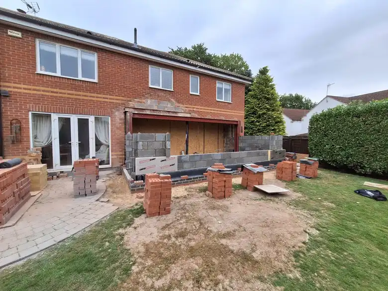Footings and first courses across the back of the house