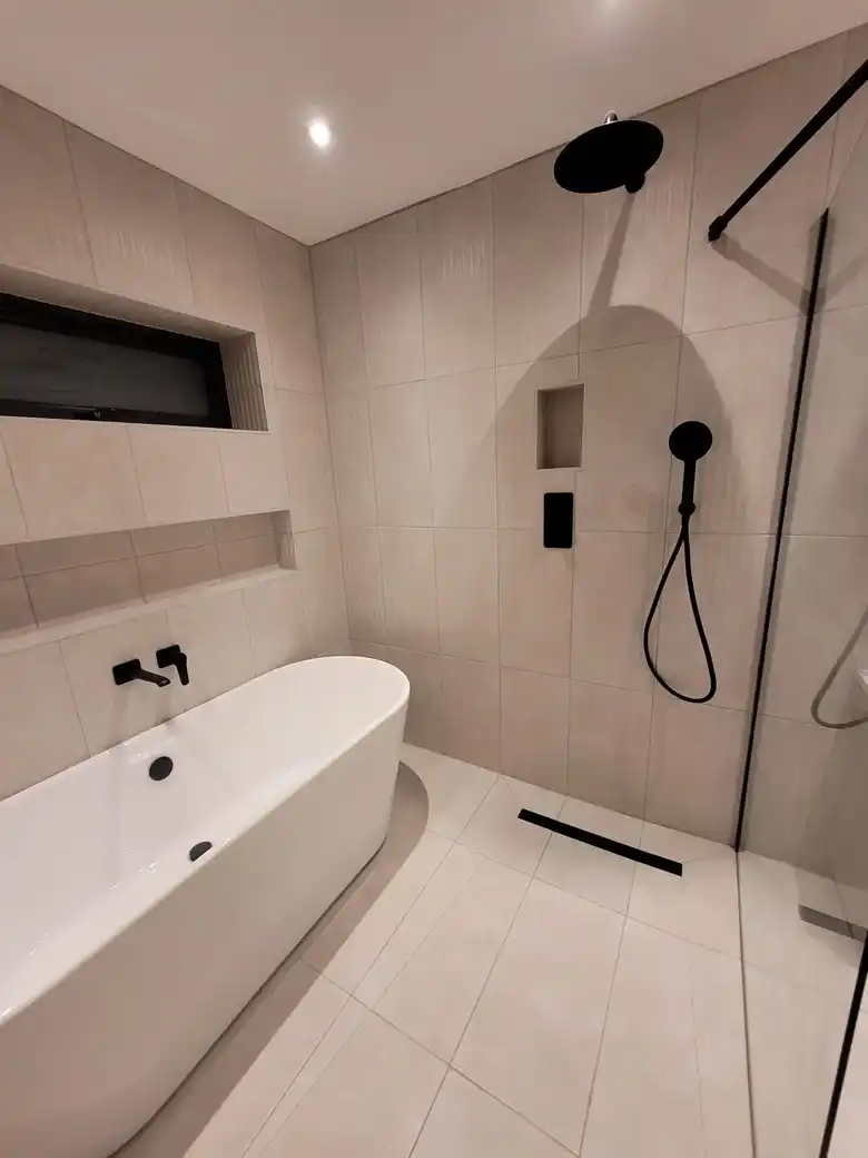 Freestanding bath and walk in shower at Mallorie Court