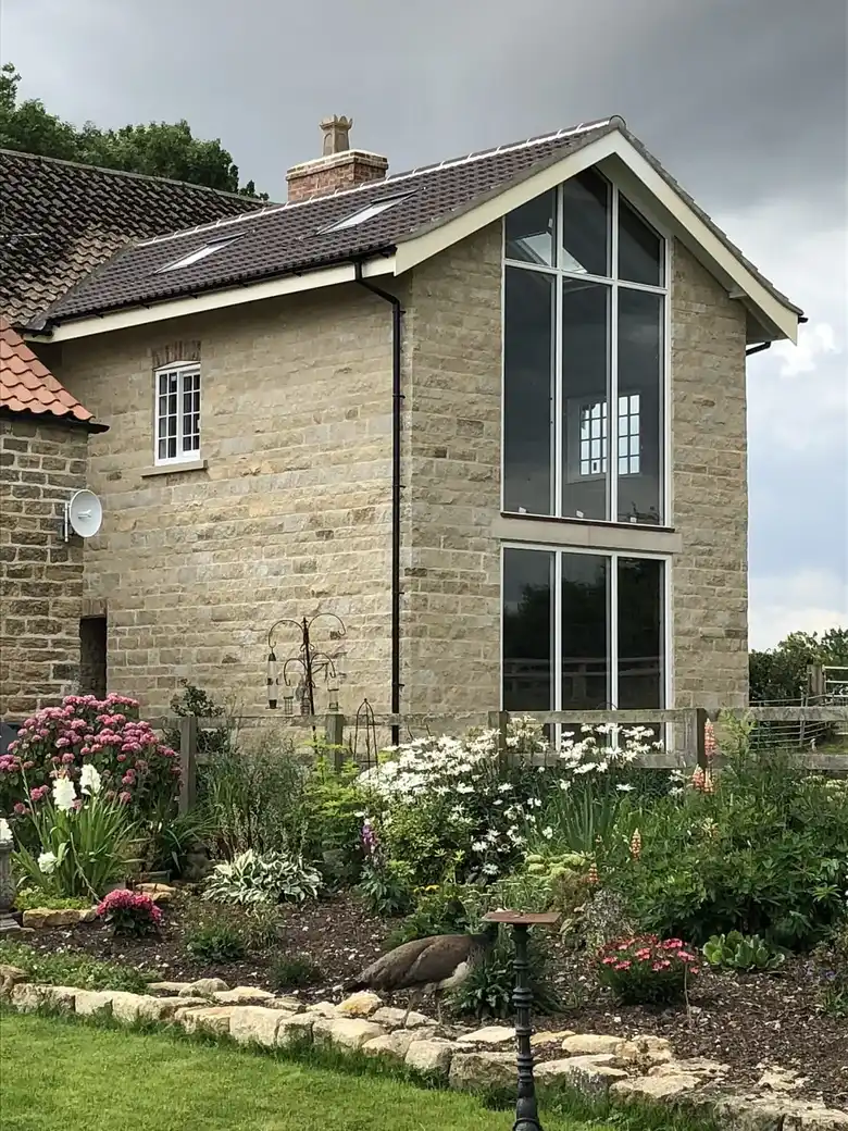Glazed gable on a stone house