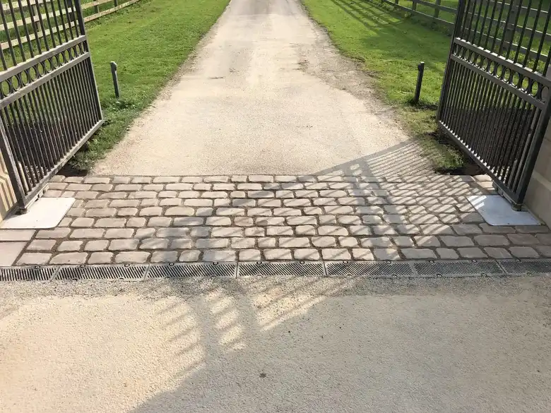 Granite setts across a gateway