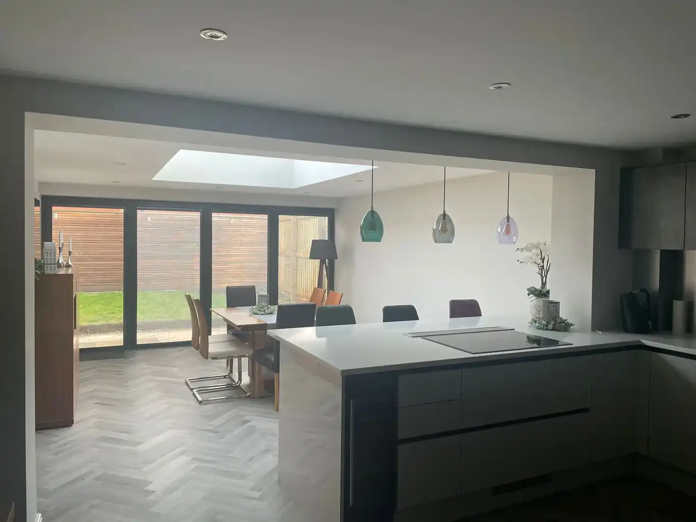 Kitchen extension with roof lantern and bifold doors