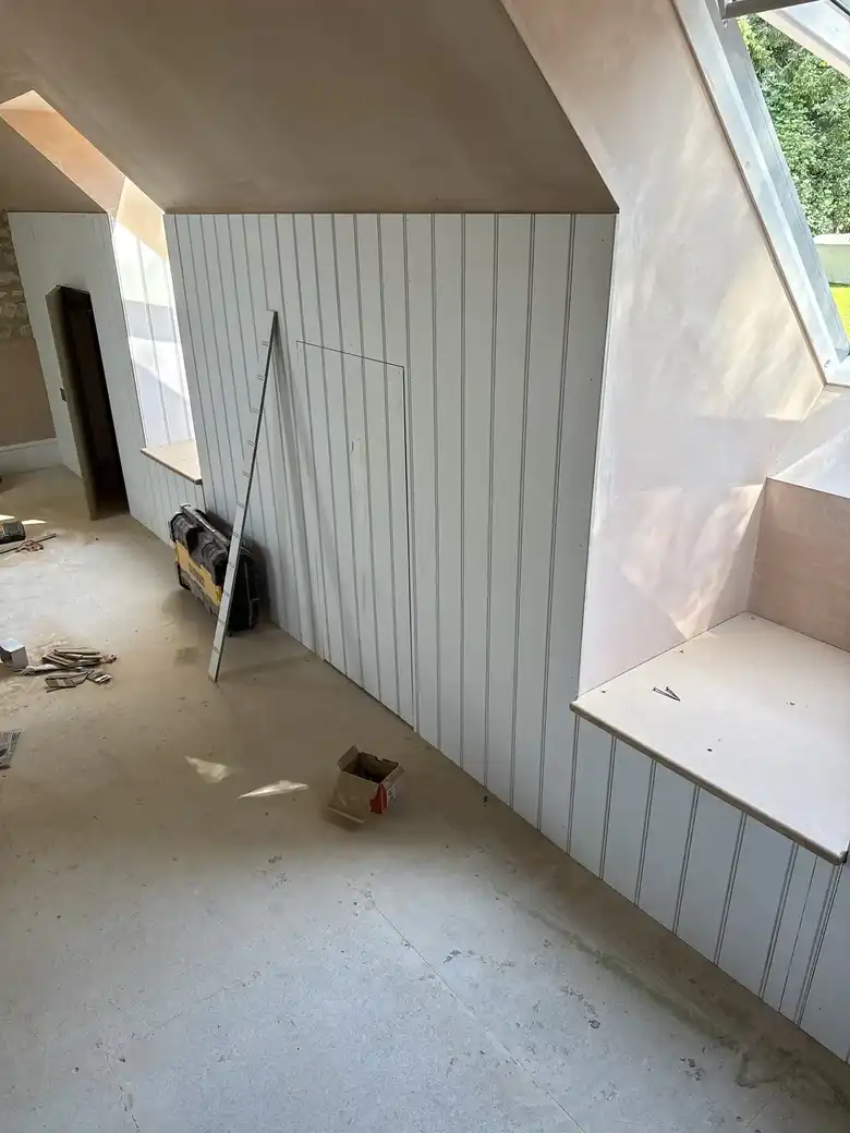 Loft room with rooflight and panelling