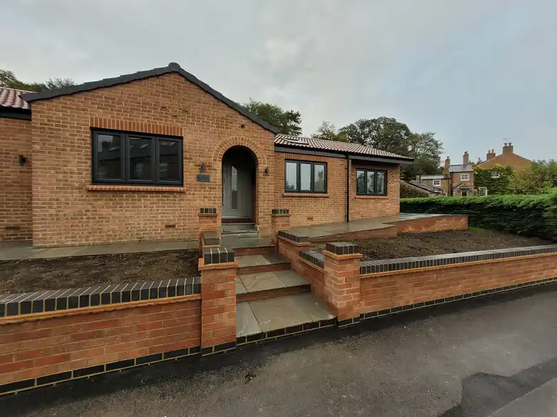Mallorie Court bungalow in Ripon after the rebuild with new brick walls and steps