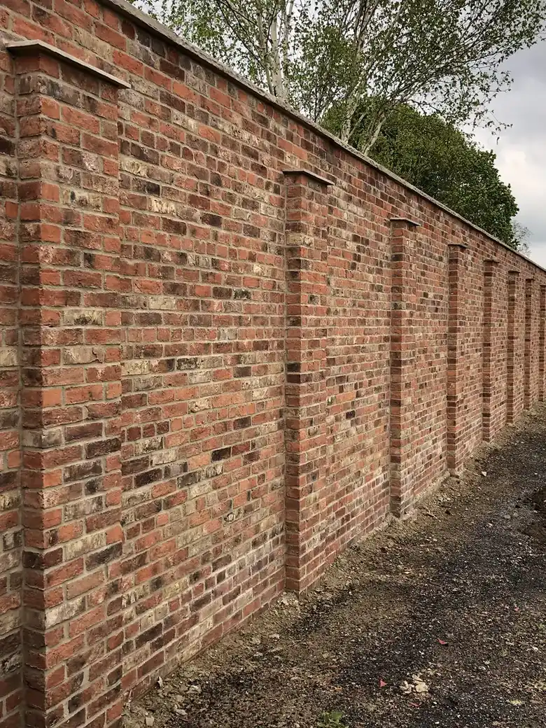 New reclaimed brick garden wall