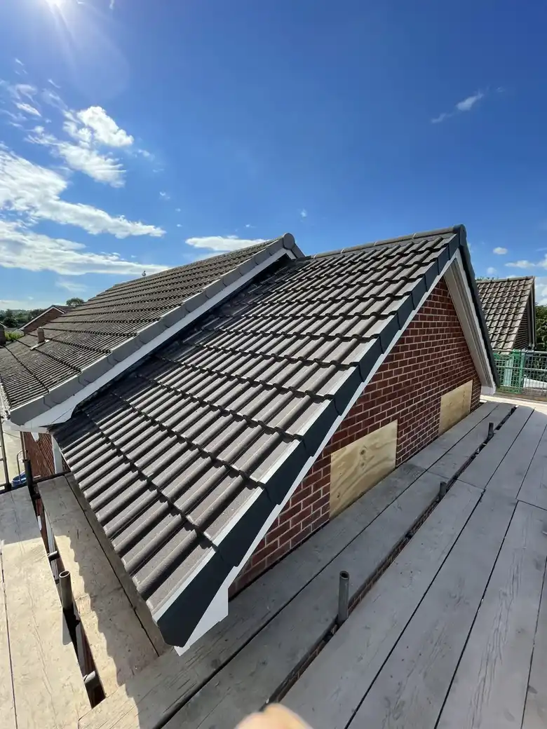 New tiled roof slope on a dormer