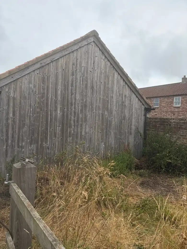 Old timber clad barn at Model Farm before work started