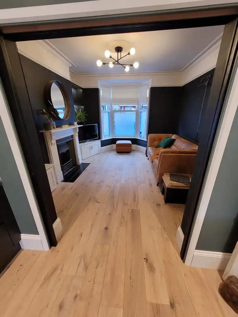 Renovated room with an oak floor