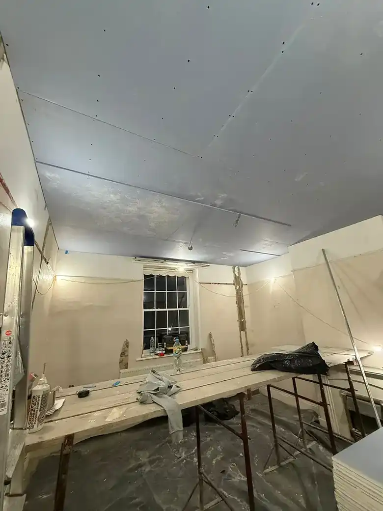 Room being plastered