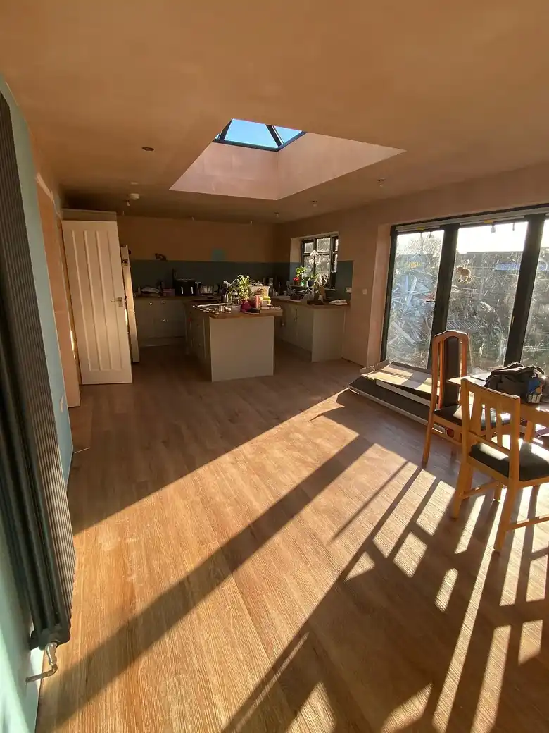 Room with oak floor and rooflight