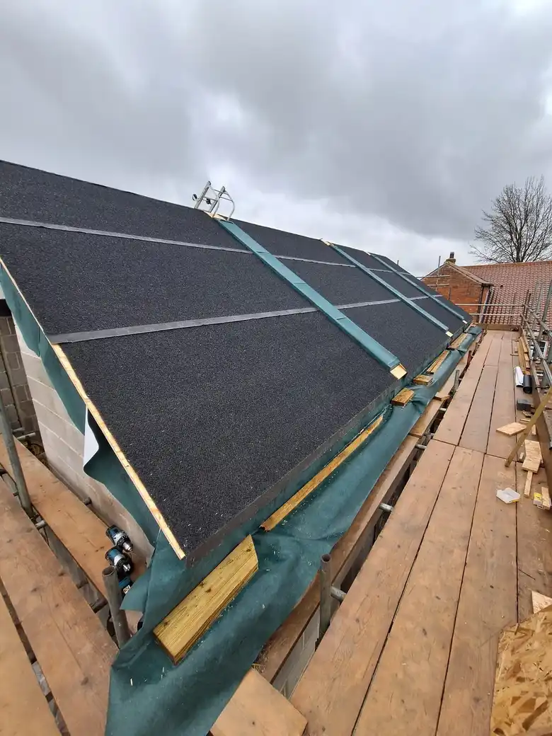 Slate roof with rooflight openings