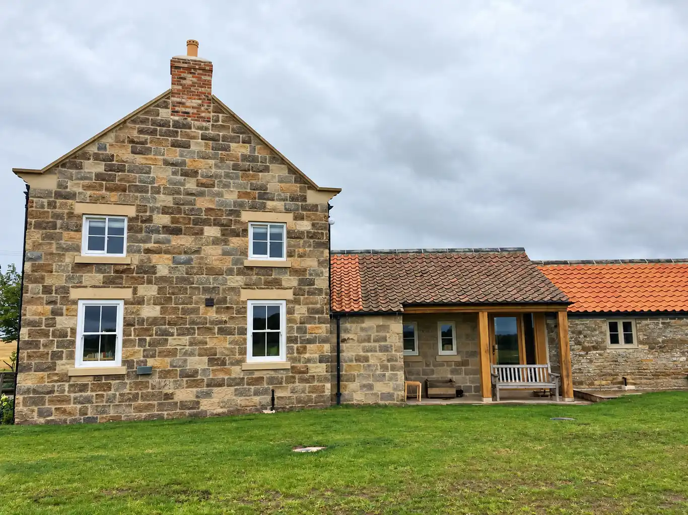 Stone farmhouse built by Barlow Construction