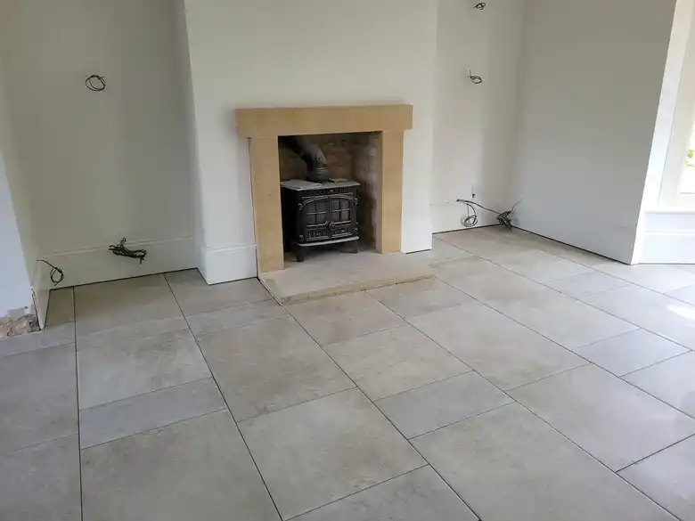 Stone fireplace in a renovated room