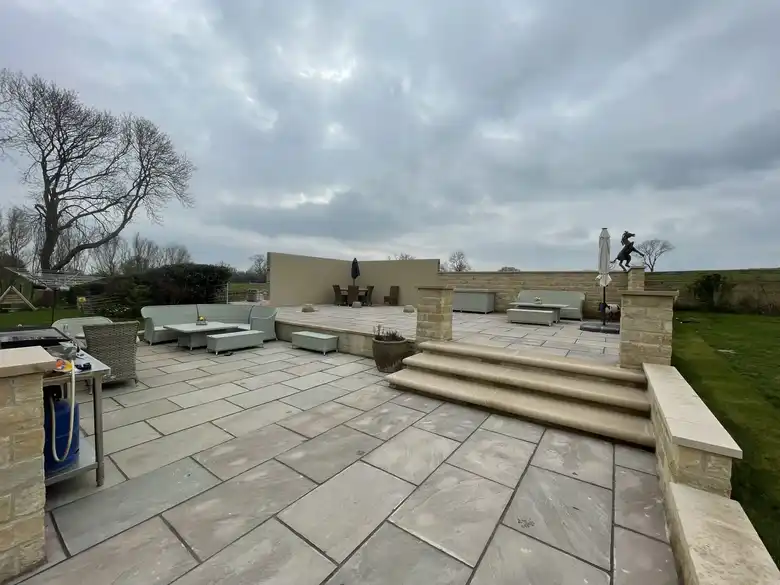 Raised sandstone terrace with steps